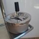Vintage chrome metal floor ashtray with integrated tray.