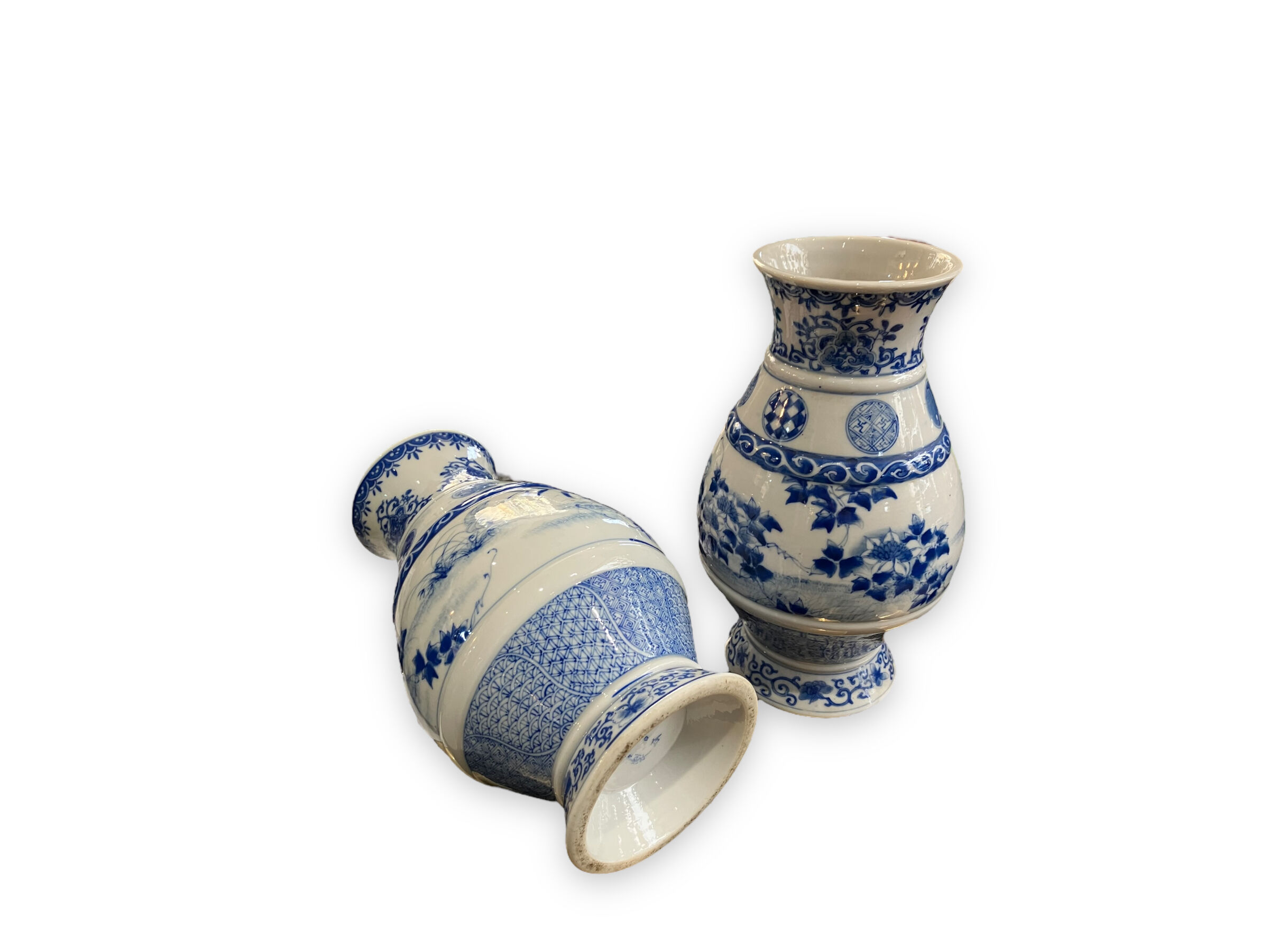 Pair of Asian vases in white and blue porcelain