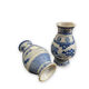 Pair of Asian vases in white and blue porcelain