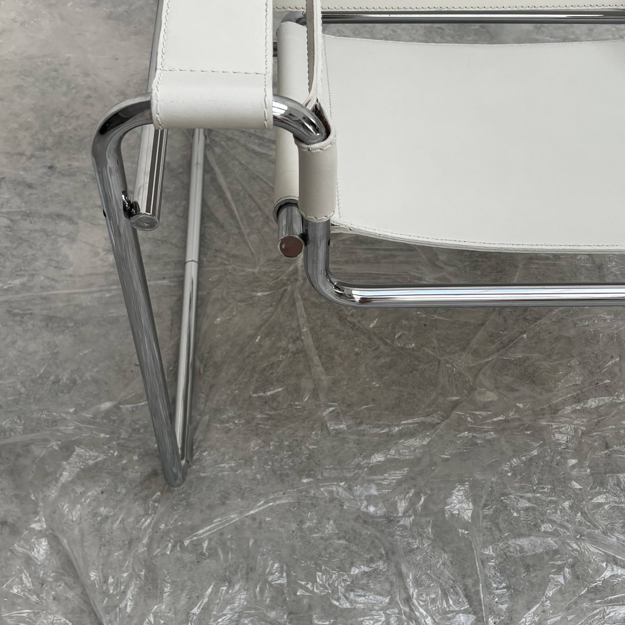 "Wassily" armchair by Marcel Breuer for Gavina in white leather.