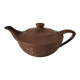 Japanese teapot in red clay engraved with integrated filter.