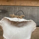 Plaster face wall statue