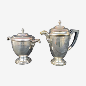 Silver metal coffee maker and sugar bowl set