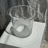 Glass ice or champagne bucket with stylized petal patterns