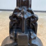 Pair of cast iron chenets with stylized faces High Epoch SEVENTEENTH century