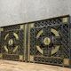 pair of monogrammed cast iron doors from the Art Deco period