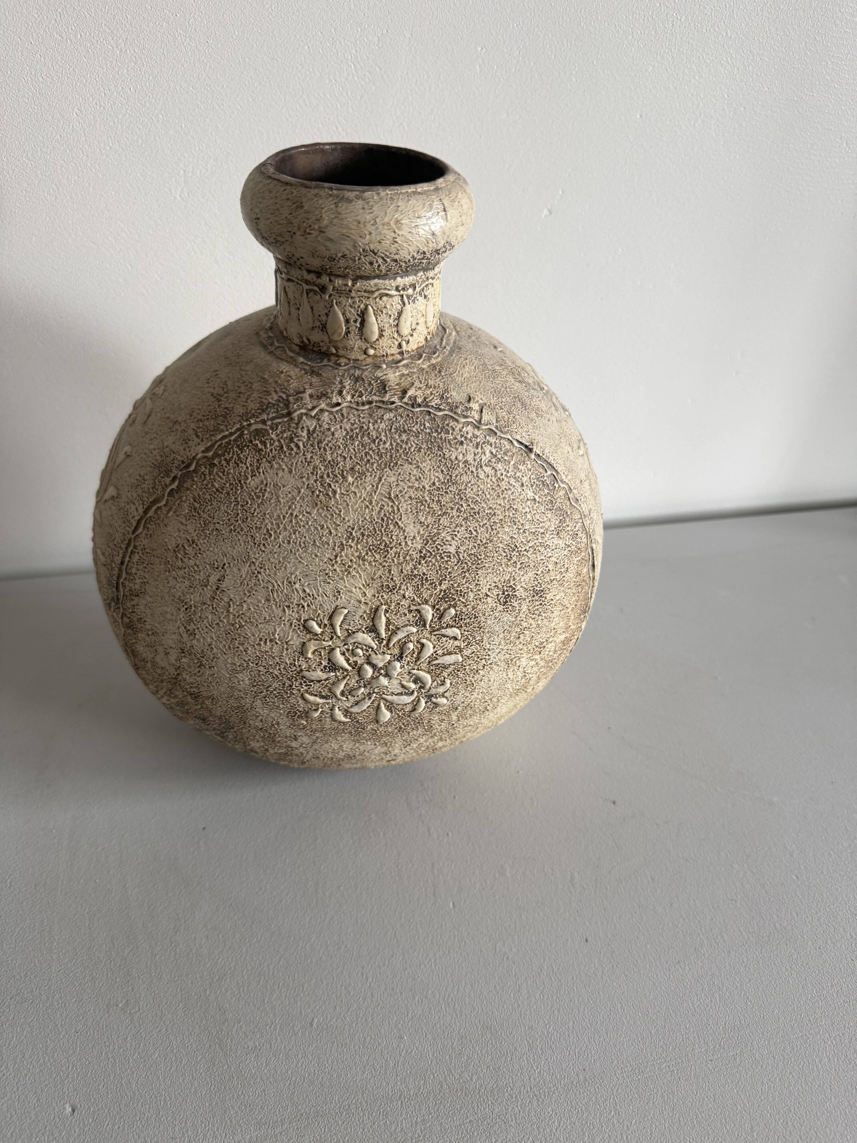 decorative handcrafted metal bottle / India