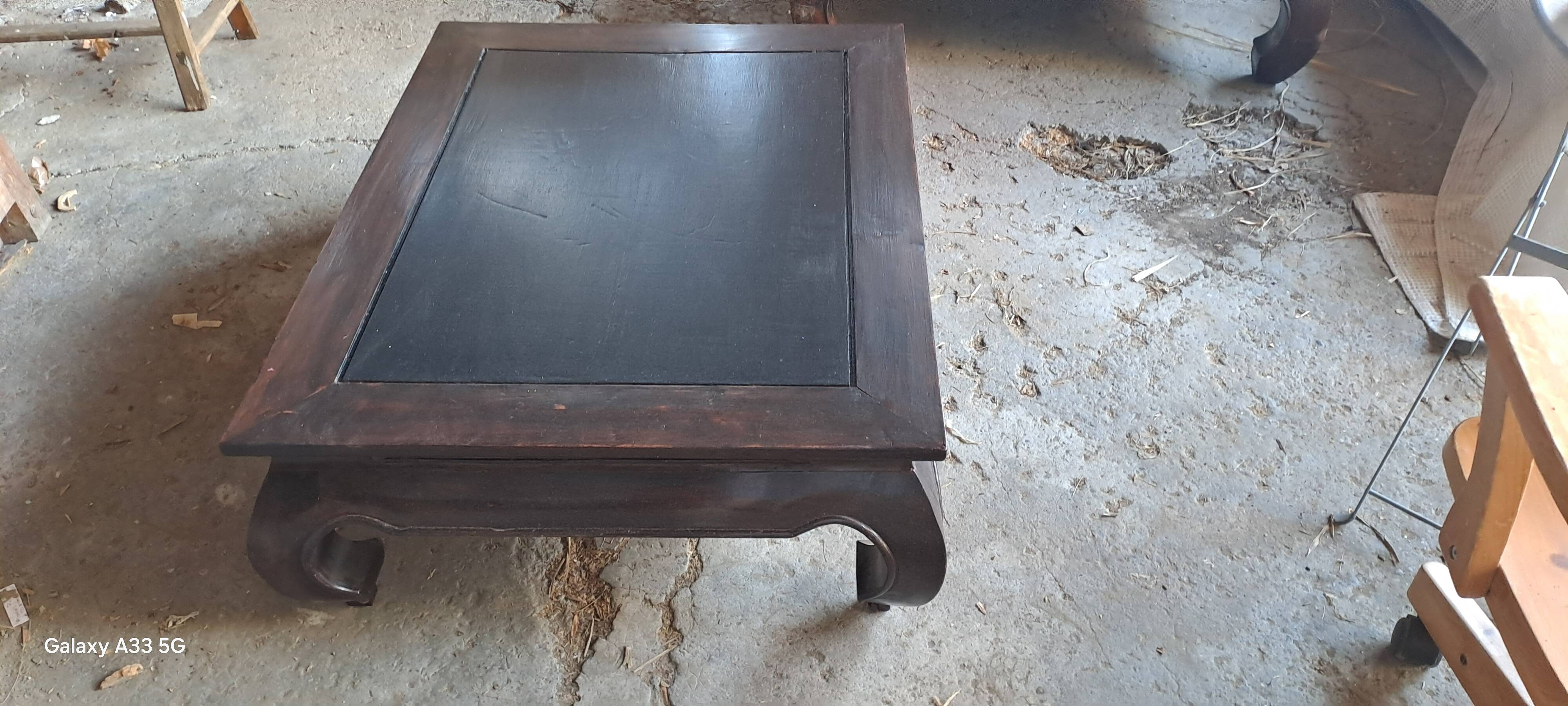 Rectangular coffee table made of exotic solid wood from the 1980s.
