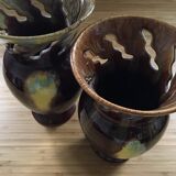 Pair of flaming ceramic vases