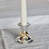 Small vintage silver-plated metal candlestick with a gold bow