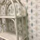 White rattan library shelf