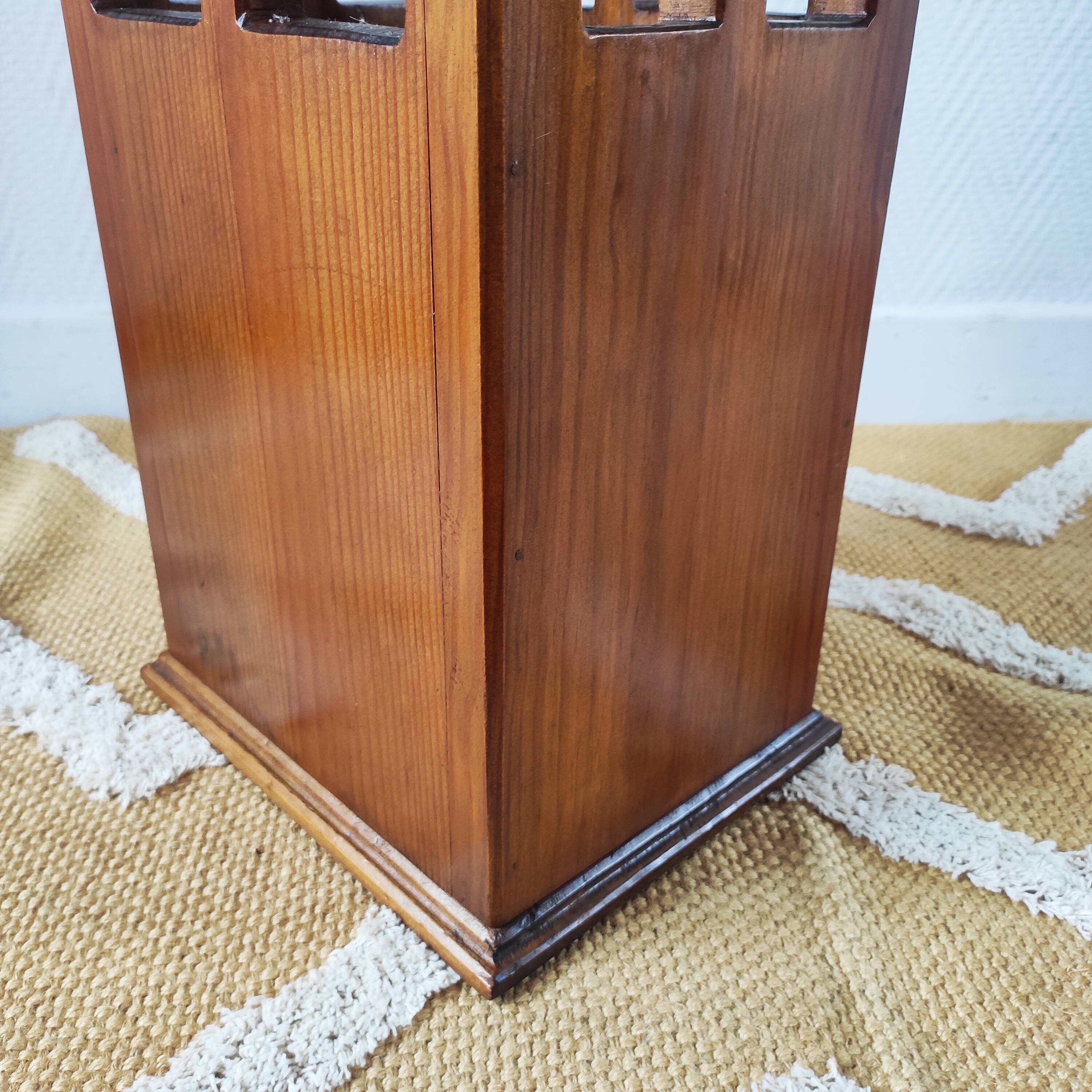 Vintage brutalist umbrella stand made of solid wood.