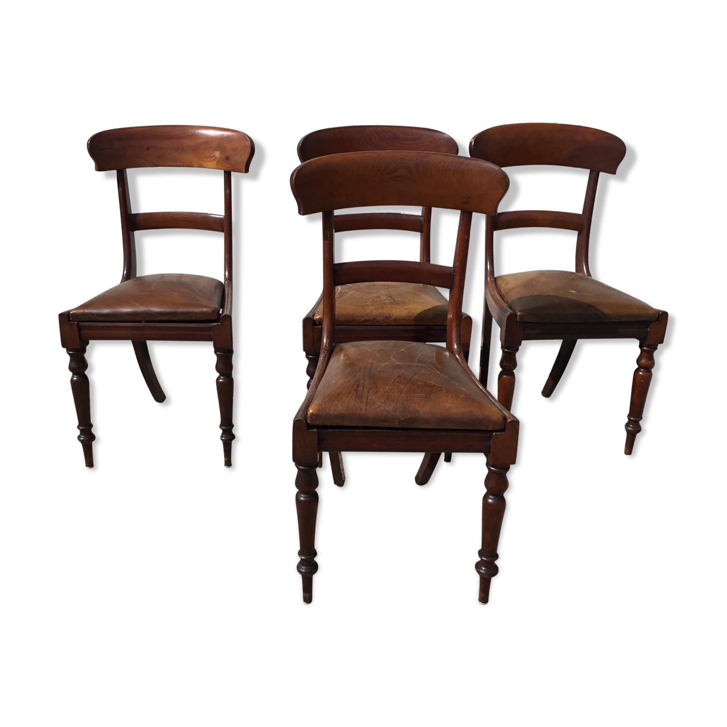 A series of 4 mahogany chairs with 19th th eme leather patties in good condition