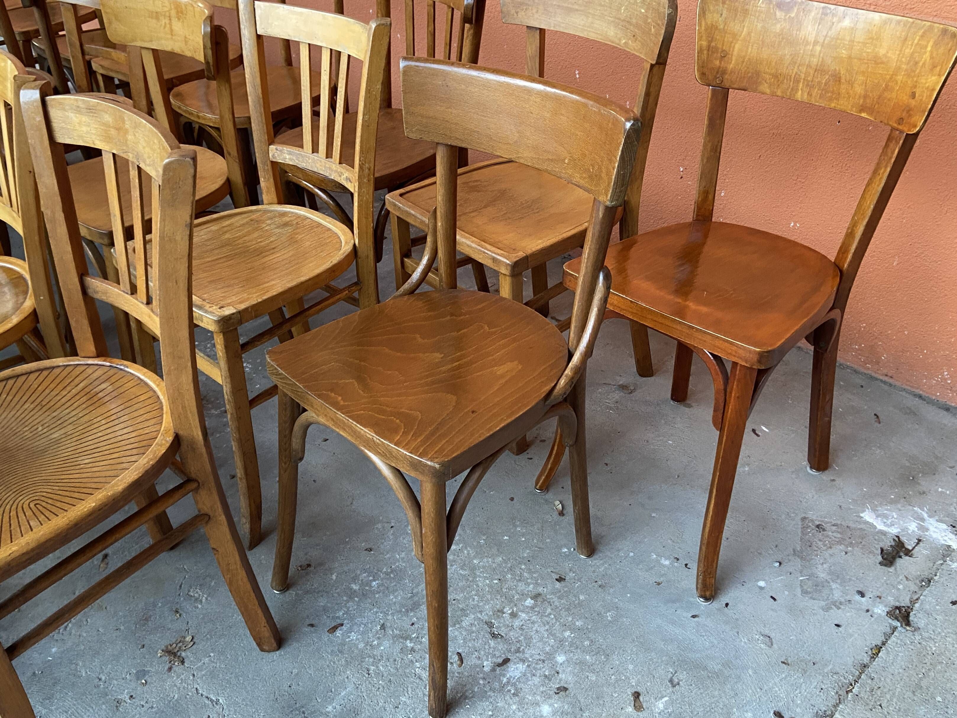 Set of 30 mismatched bistro chairs French Restaurant curved wood