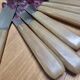 12 vintage knives in a box + 1 butter knife