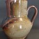 Glazed terracotta pitcher from the 20th century.