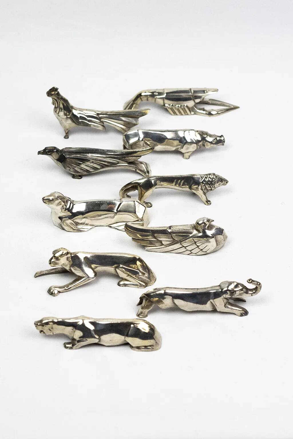 10 porte-couteaux animaliers Art déco en métal argenté – dlg Sandoz, Gallia