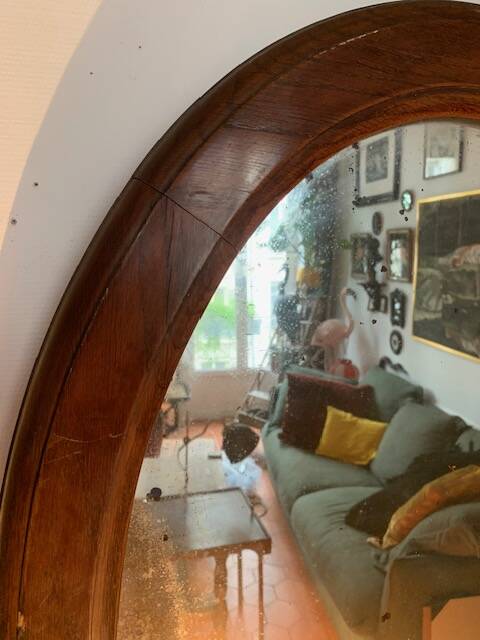 Large antique oval mahogany mirror, mercury glass, 19th century
