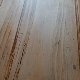 Antique wooden desk with a patinated base