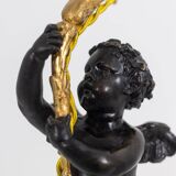 Lampe en bronze représentant un putti, socle en marbre. Circa 1880.