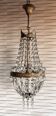 Crystal and gilded bronze chandelier – timeless elegance hotel spirit