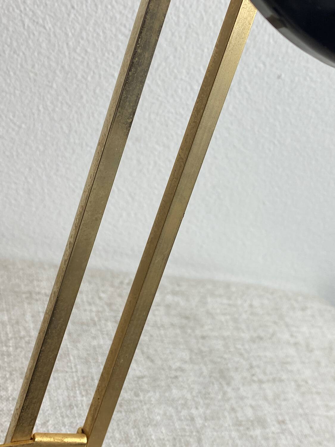 Wall-mounted coat rack with 3 hooks from the 1960s.