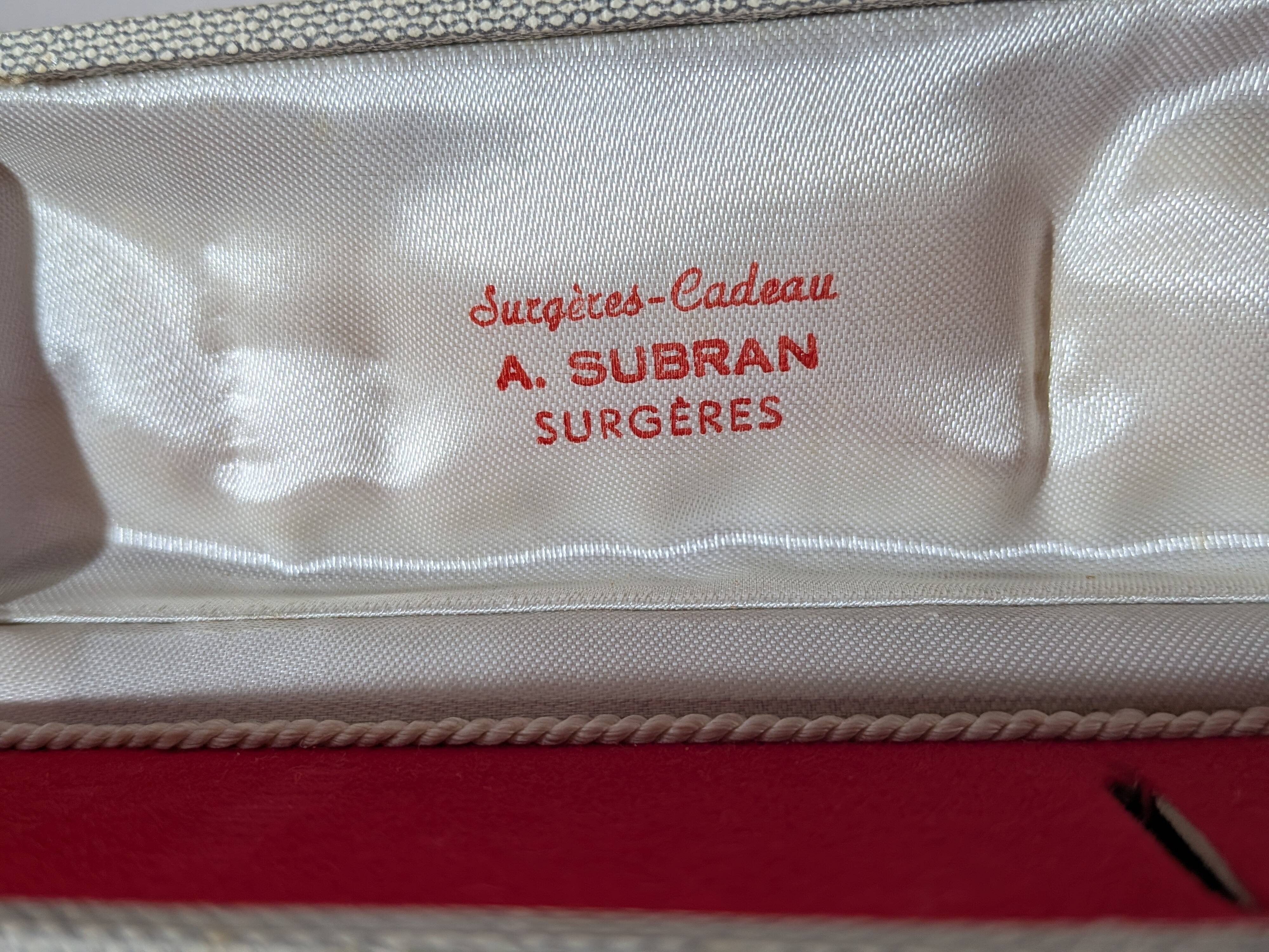 Vintage gold sugar tongs with case