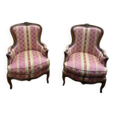 Paire de fauteuils - bergères de style Louis XV en soierie