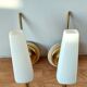 Pair of sconces with a light arm, brass and white opaline 1960.
