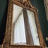 Miroir doré en bois