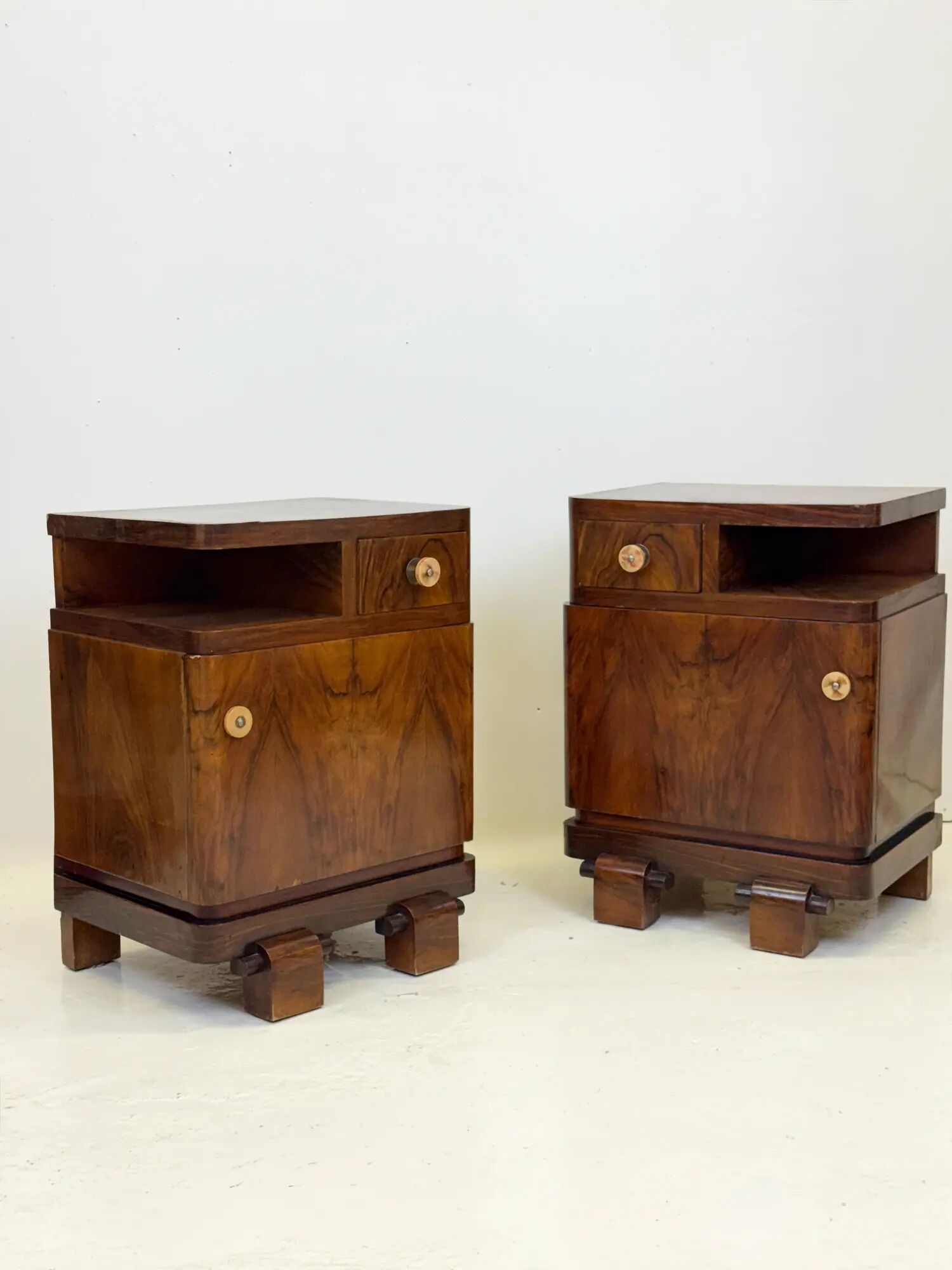 Pair of Art Deco bedside tables in walnut — Italy, 1930-1940