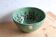 Large glazed ceramic salad bowl with a floral design.