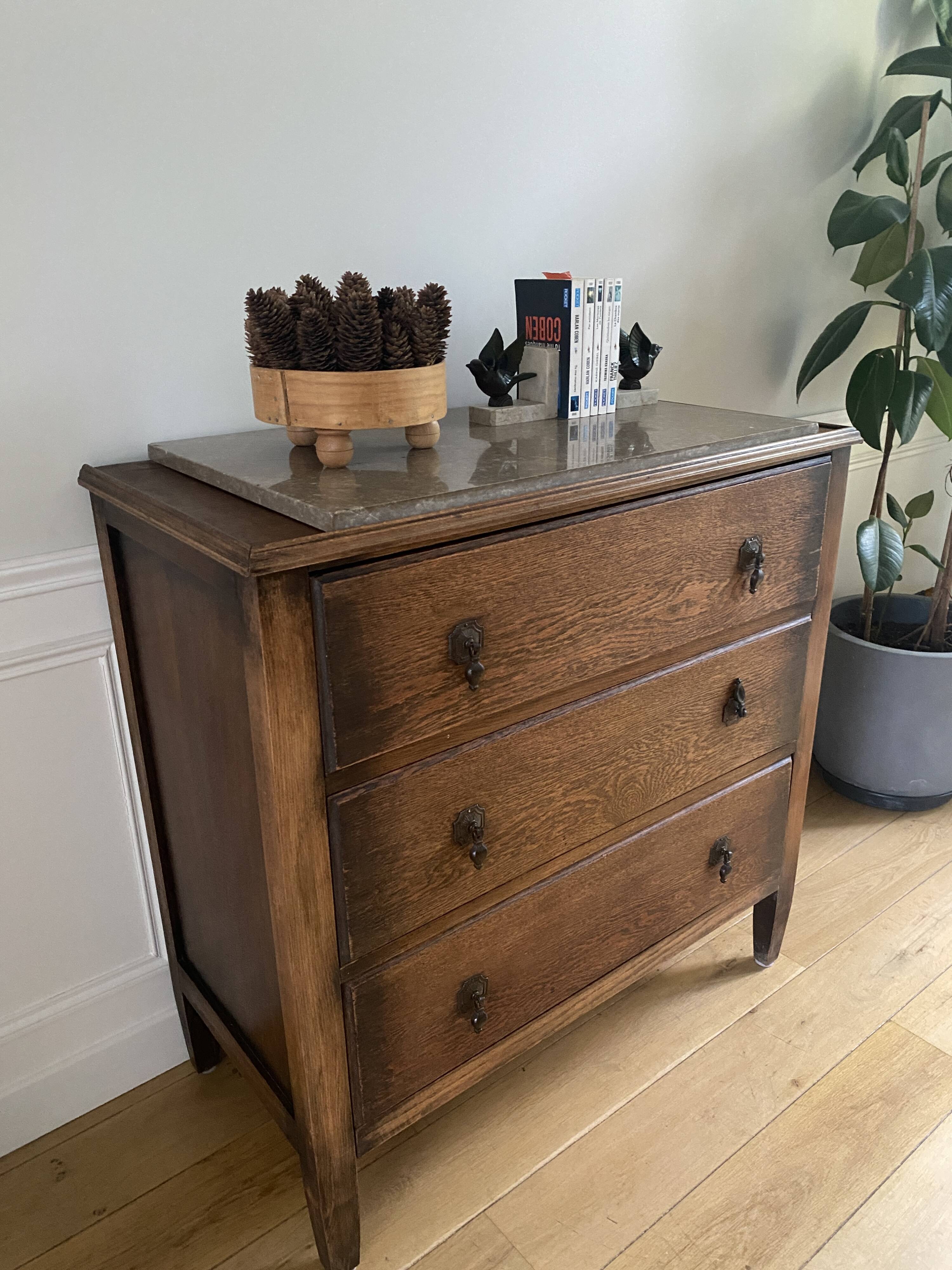 Vintage wooden chest of drawers with three drawers and brown marble top