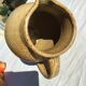 Beige handcrafted speckled sandstone pitcher