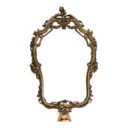 Rocaille style mirror from the 20th century in wood and gilded stucco, Putto on the pediment