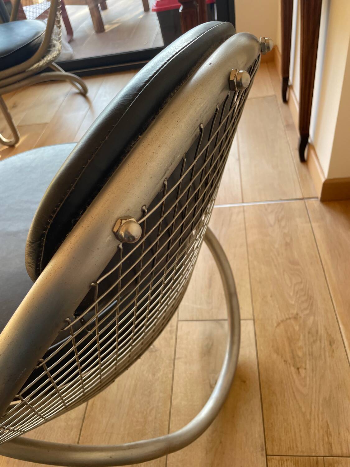 Metal and leather armchairs