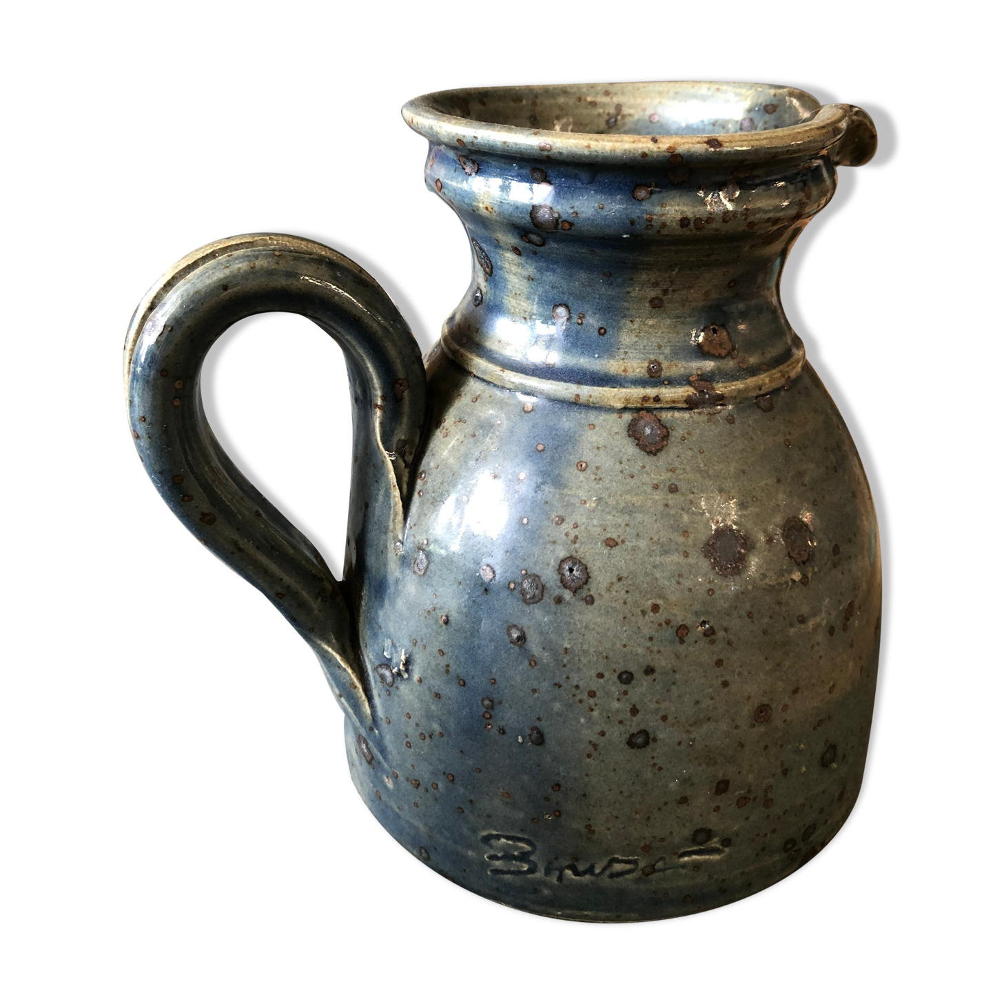 Handmade bluish enamelled sandstone pitcher speckled with brown