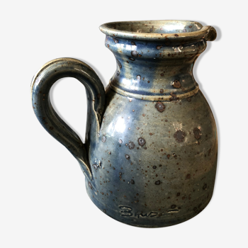 Handmade bluish enamelled sandstone pitcher speckled with brown