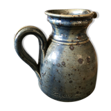 Handmade bluish enamelled sandstone pitcher speckled with brown