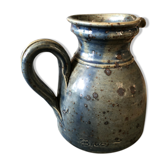 Handmade bluish enamelled sandstone pitcher speckled with brown