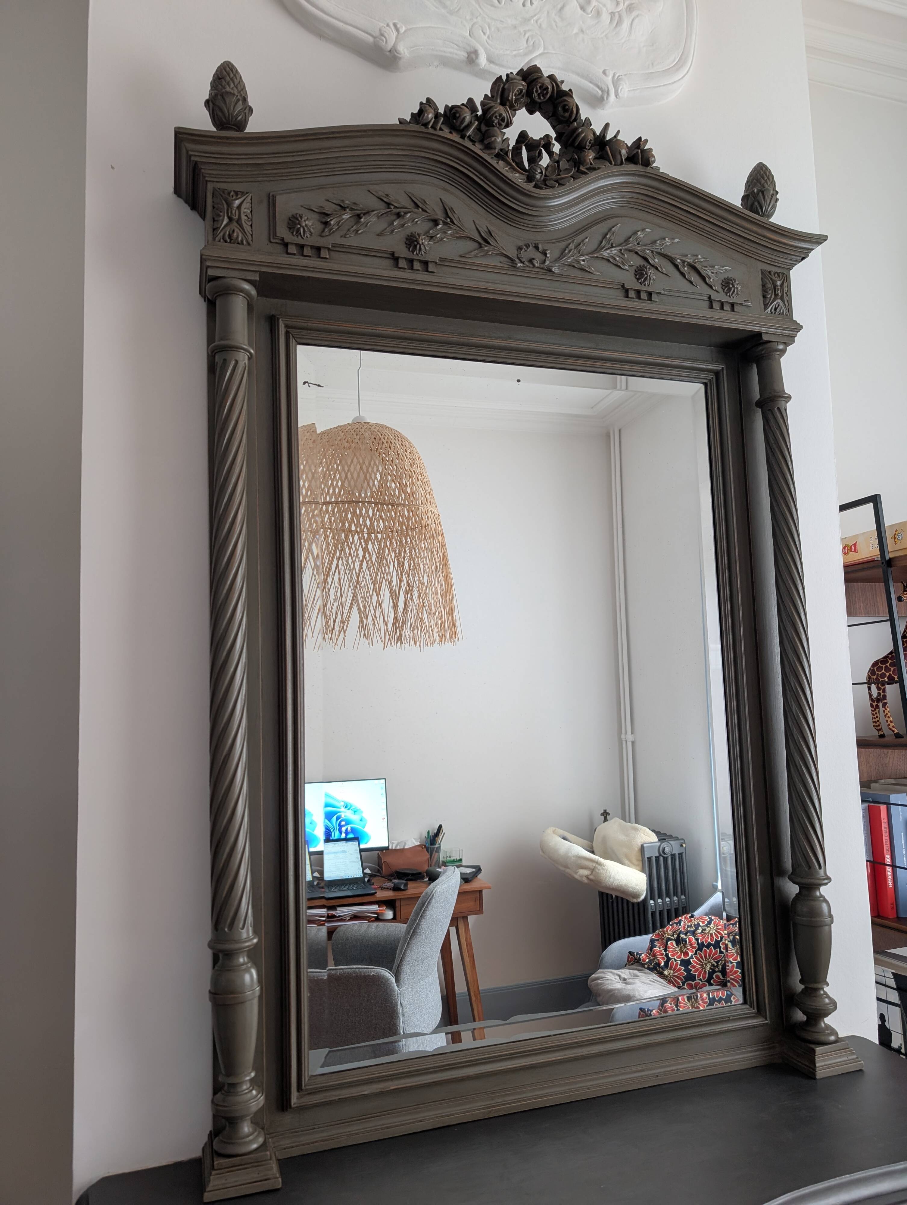 Antique carved mirror with a grey-green patina, Louis XVI style.
