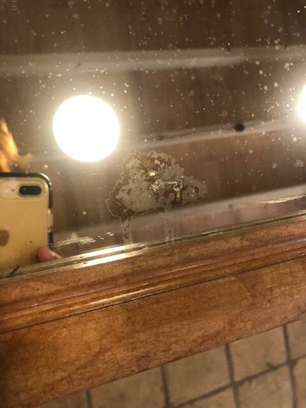 Grand miroir art déco en bois