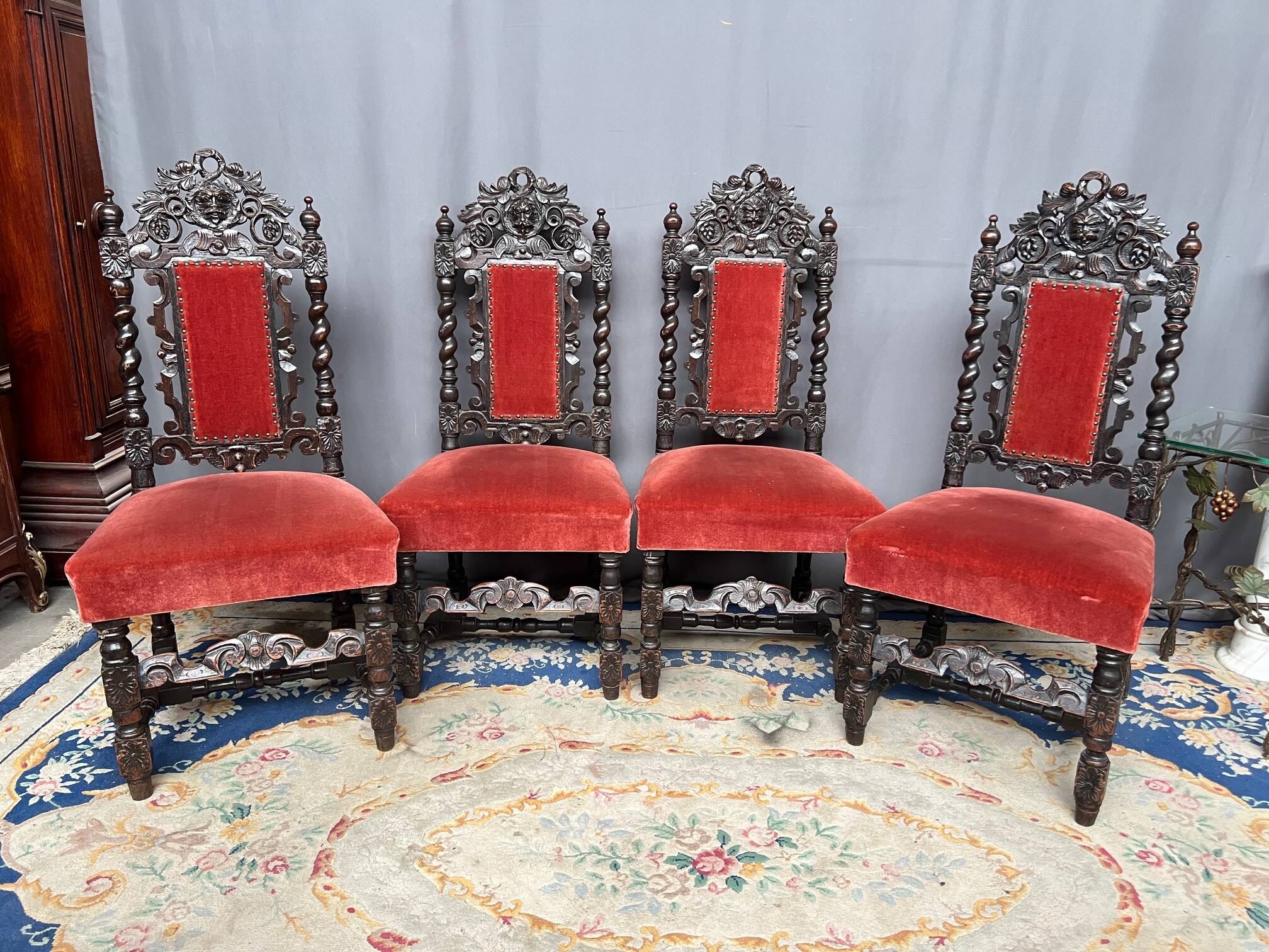 Set of 4 antique Renaissance-style oak chairs.