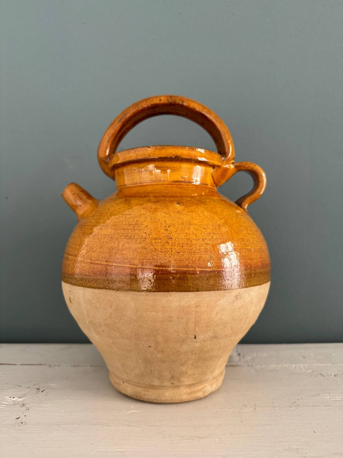 Old terracotta gargoulette jug