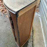 Small wooden corner accent table.