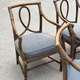 Set of 4 vintage McGuire rattan chairs with cushions.