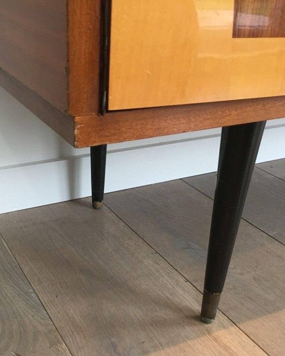 Mahogany enfilade on a blackened wooden base