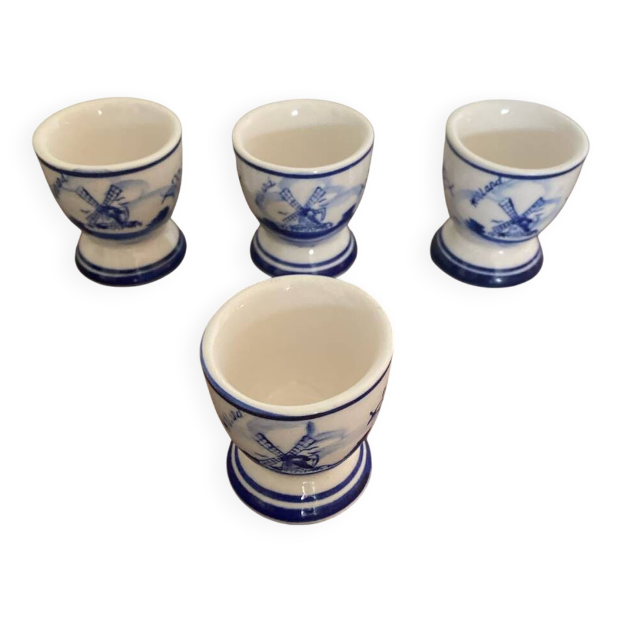 Set of 4 antique delft egg cups, white ceramic with blue vinta decor