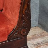 Sleeper or bench from the Charles X period in richly carved mahogany.