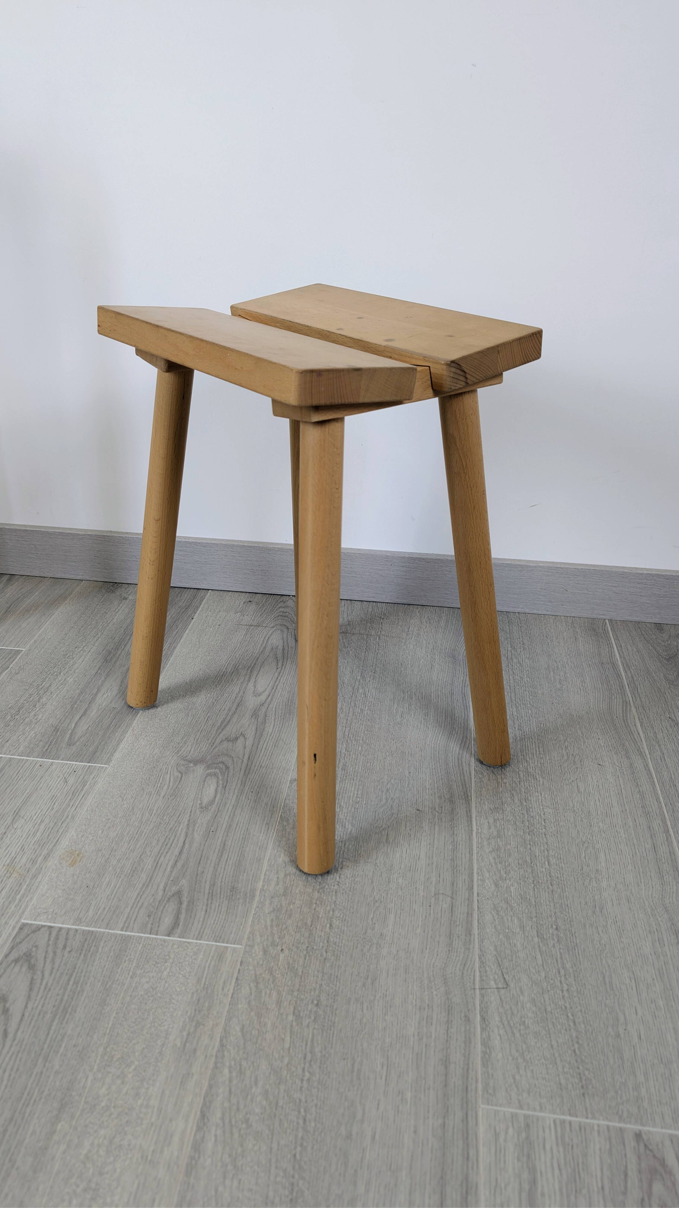 Nordic design wooden stool model ypperlig by ikea with a minimalist seat.